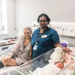 I WAITED OUTSIDE THE HOSPITAL ROOM, WHILE EVERYONE ELSE GOT TO MEET MY GRANDCHILD FIRST