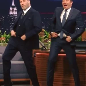 John Travolta shows up to perform the iconic moves we all remember – 40 years since legendary movie Grease.