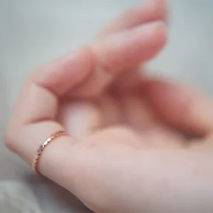 Women wearing rings on pinky fingers: What does it mean?