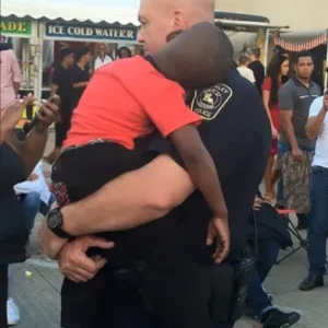 He Fell Asleep in a Police Officer’s Arms—But That’s Not Why People Whispered