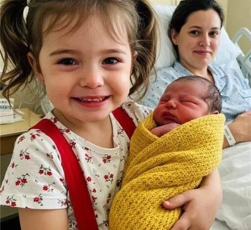 MY DAUGHTER WAS THRILLED TO HOLD HER NEWBORN SISTER, UNTIL SHE WHISPERED ONE WORD THAT SHOOK ME TO MY CORE!