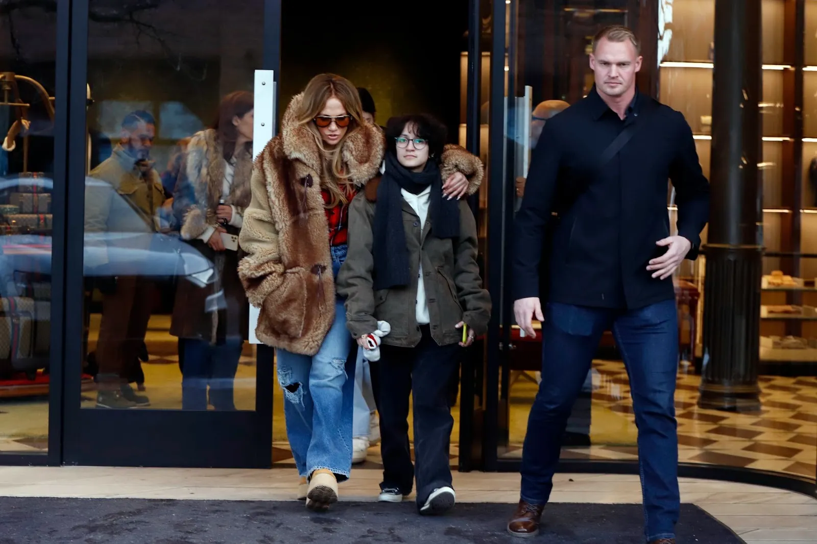 JLo, 56, Sparks a Heated Buzz with the Brown Fur Coat She Chose to Wear with Shredded Jeans for Christmas Outing